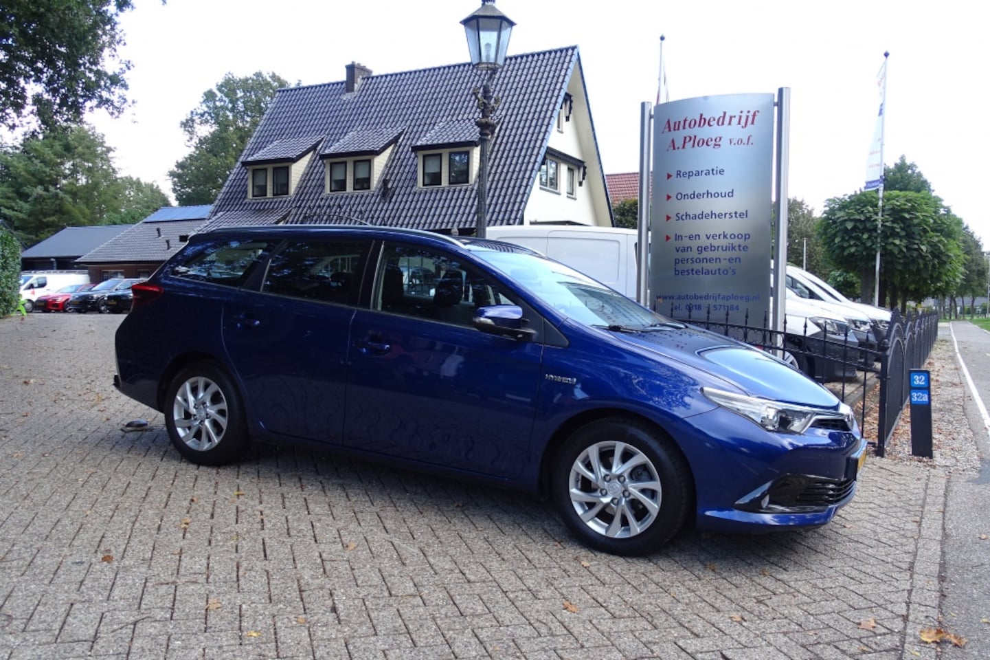 Toyota Auris Touring Sports - 1.8 Hybr. Aspiration - AutoWereld.nl