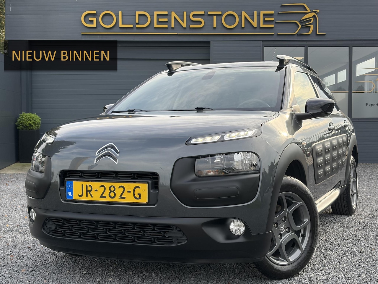 Citroën C4 Cactus - 1.2 PureTech Shine ✓2e Eigenaar✓Recent beurt gehad✓D-riem vv in 2023✓Camera✓Trekhaak✓Navi✓ - AutoWereld.nl
