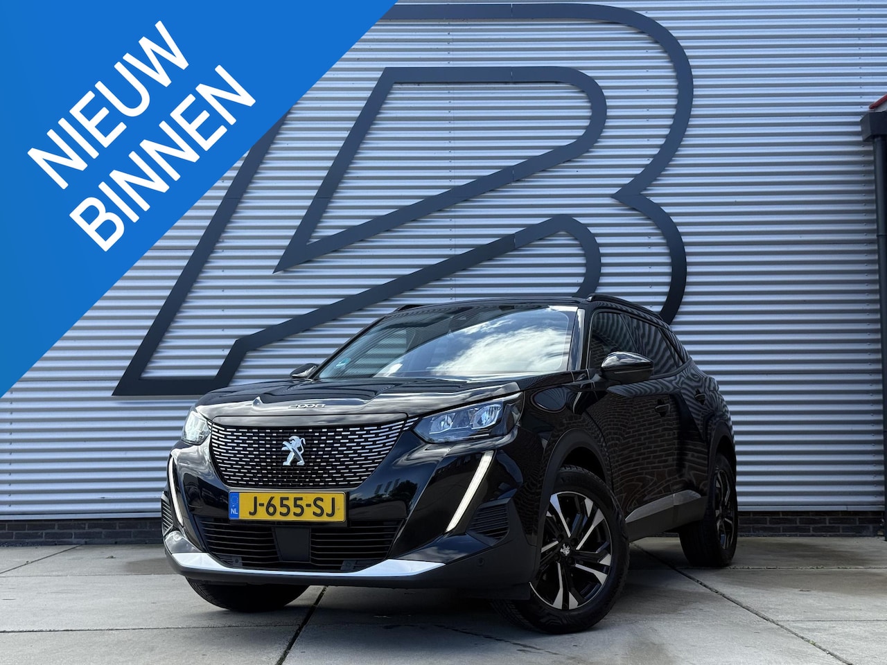 Peugeot 2008 - 1.2 PureTech Allure 2e Eigenaar|Navi|Camera|Carplay|D-riem vv in 2025|Trekhaak|Cruise|PDC - AutoWereld.nl
