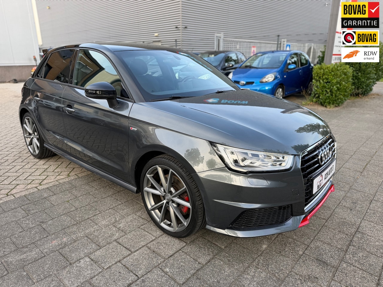 Audi A1 Sportback - 1.8 TFSI Sport|Automaat|Cruise contr| Stoelverw|Bose - AutoWereld.nl