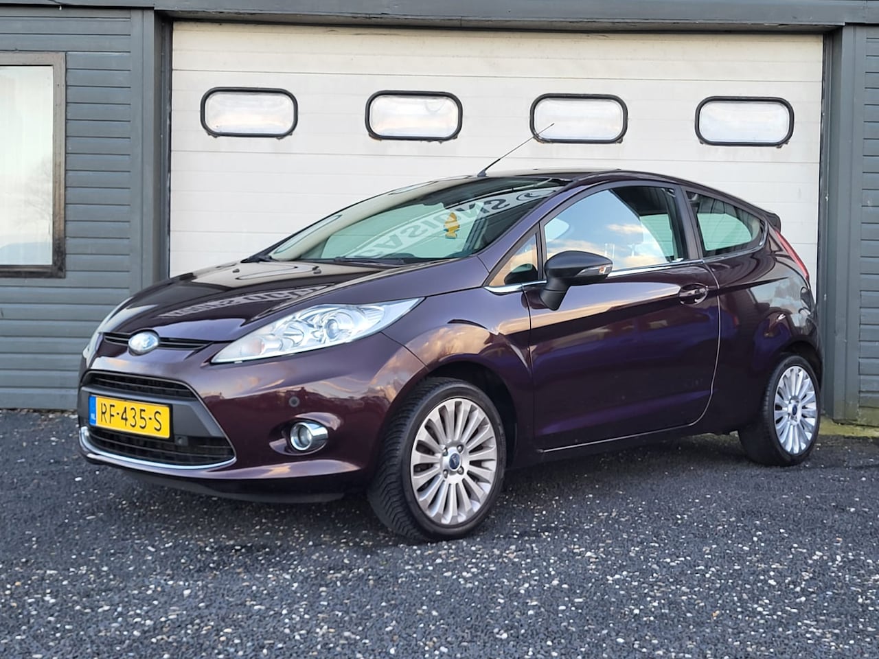 Ford Fiesta - 1.25 Titanium | APK 12-2026 | Stoelverwarming | PDC | LEES TEKST - AutoWereld.nl