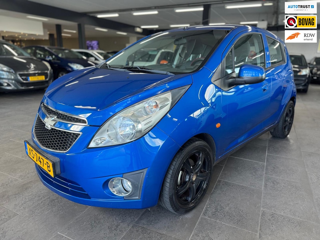 Chevrolet Spark - 1.0 16V LE airco elektrische pakket lm-velgen - AutoWereld.nl