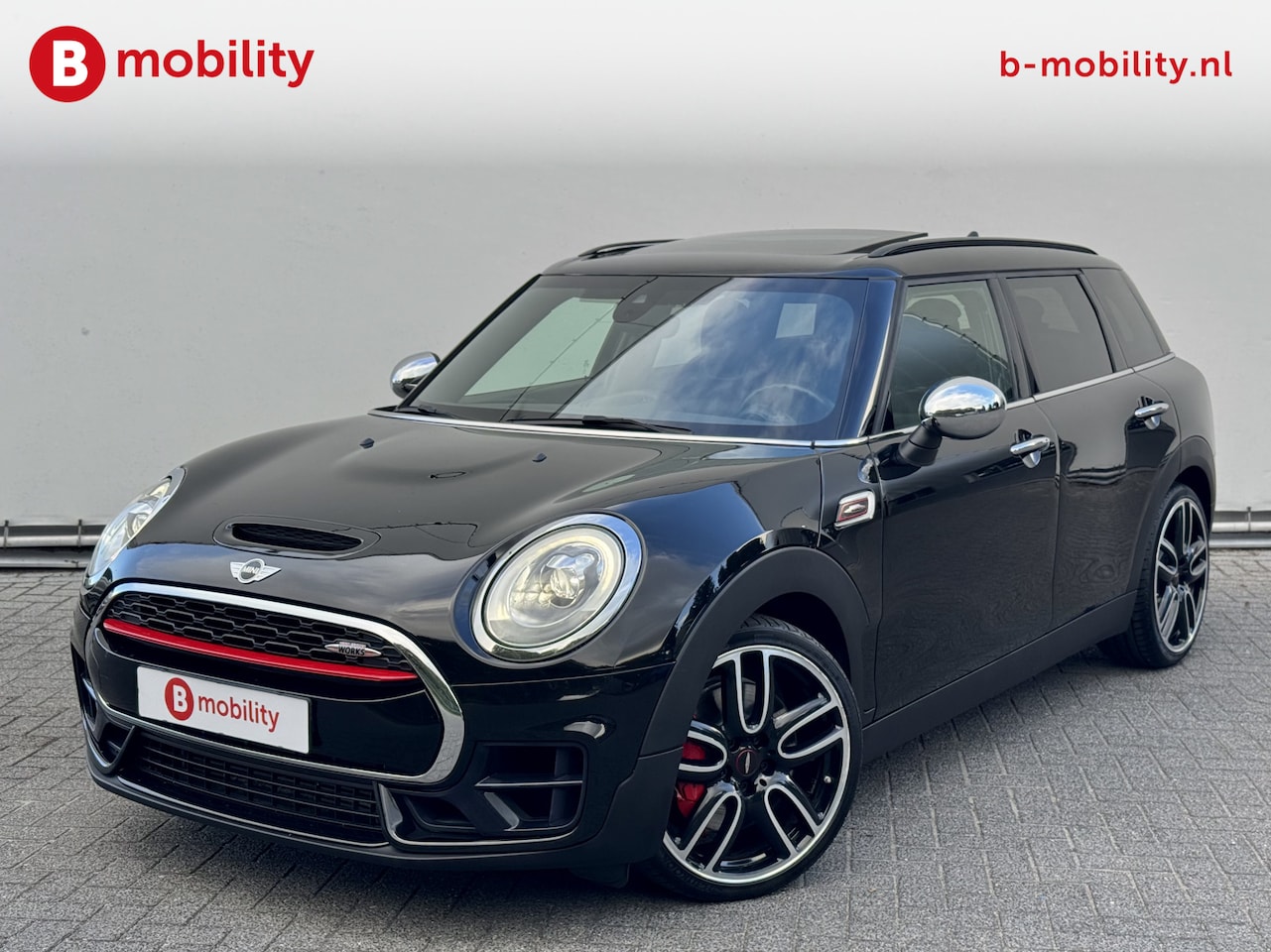 MINI Clubman - 2.0 John Cooper Works ALL4 Chili Panoramadak | LED | Stoelverwarming | Achteruitrijcamera - AutoWereld.nl