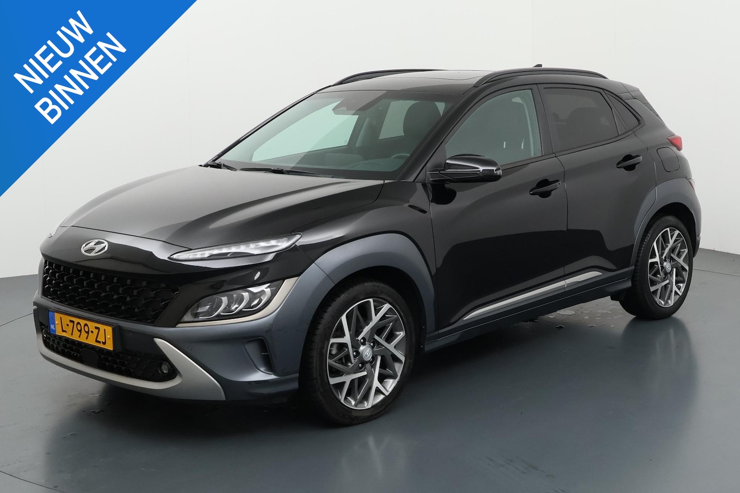 Hyundai Kona - 1.6 GDI HEV PREMIUM SKY I SCHUIFDAK I AUTOMAAT I P-CAMERA I APPLE CARPLAY I CLIMATE CONTRO - AutoWereld.nl