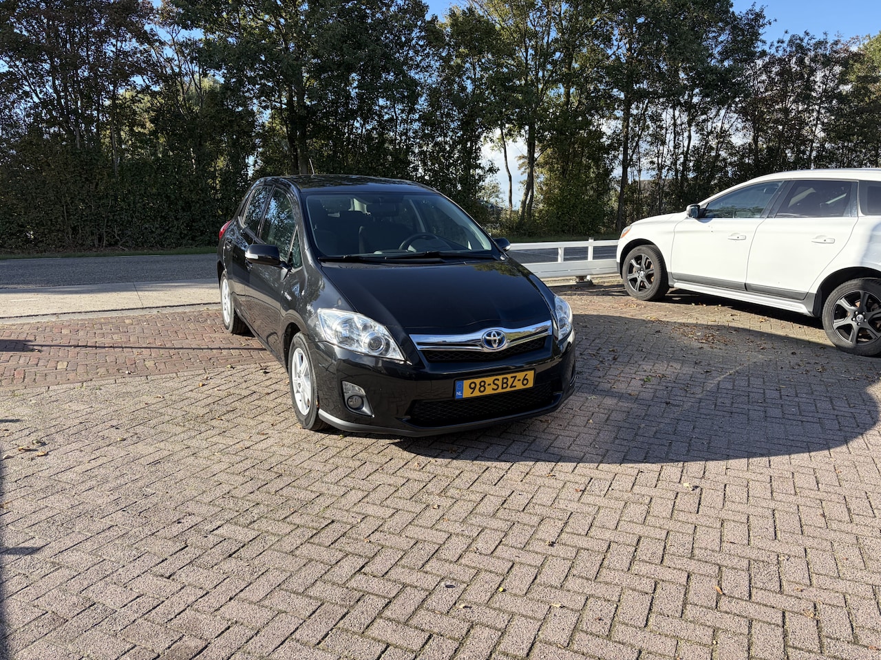 Toyota Auris - 1.8 Full Hybrid Aspiration NAVI CRUISE CLIMA - AutoWereld.nl