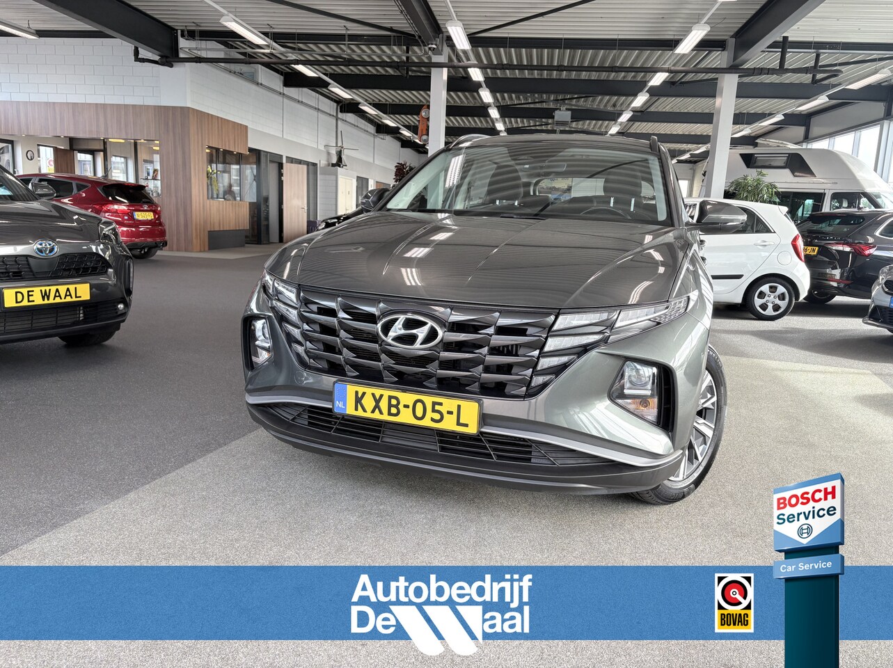 Hyundai Tucson - 1.6 T-GDi 180pk HEV i-Motion Automaat CAMERA/CARPLAY/CLIMA/CRUISE/PDC/AFN.TREKHAAK - AutoWereld.nl