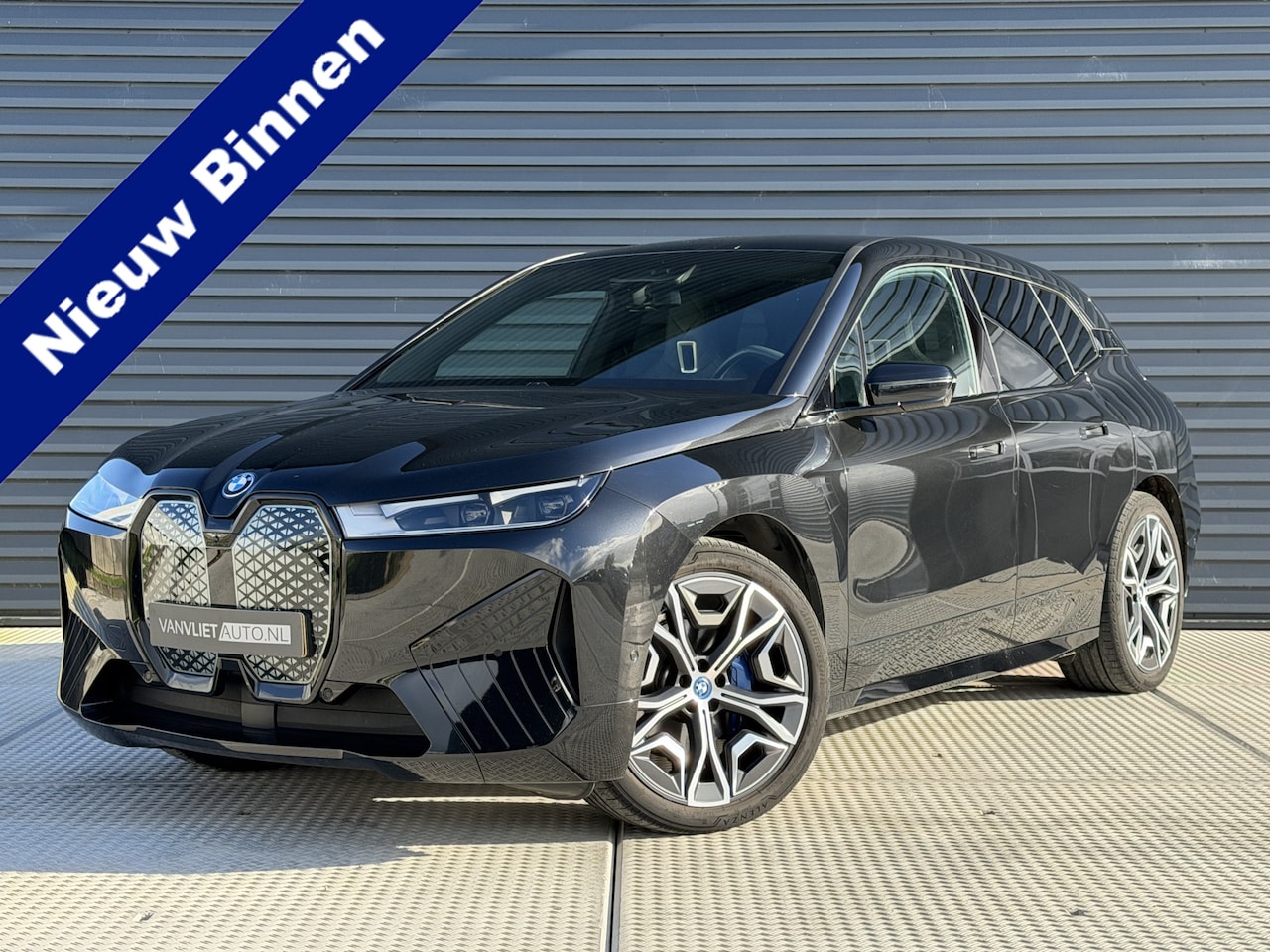 BMW iX - xDrive40 Executive 77 kWh | Sport Pakket | 360 Camera | HK Audio | Head-Up | Memory Stoele - AutoWereld.nl