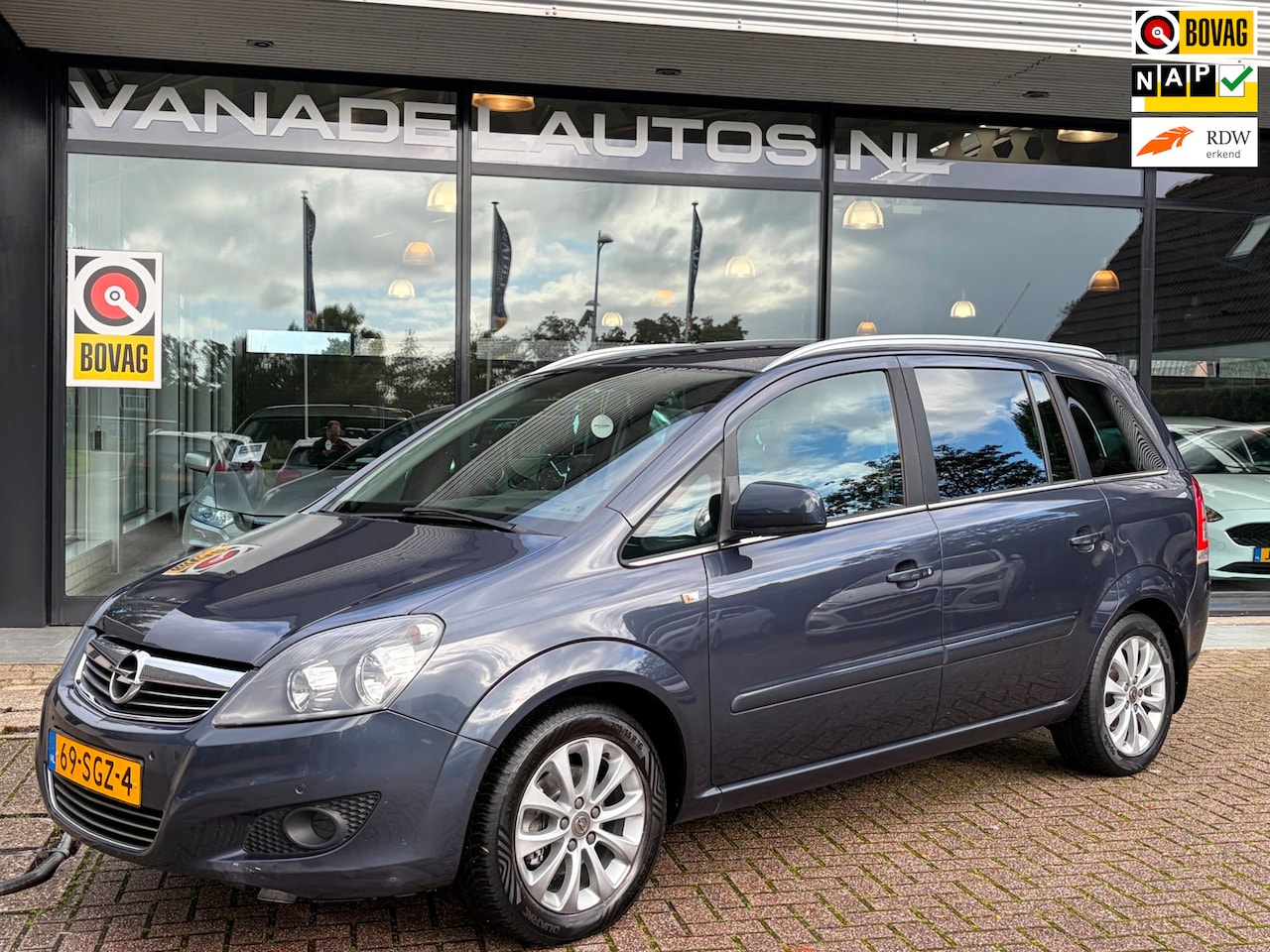 Opel Zafira - 1.8 Edition 7-Pers Navi Cruise Airco Trekhaak NL-Auto NAP Dealeronderhouden! - AutoWereld.nl
