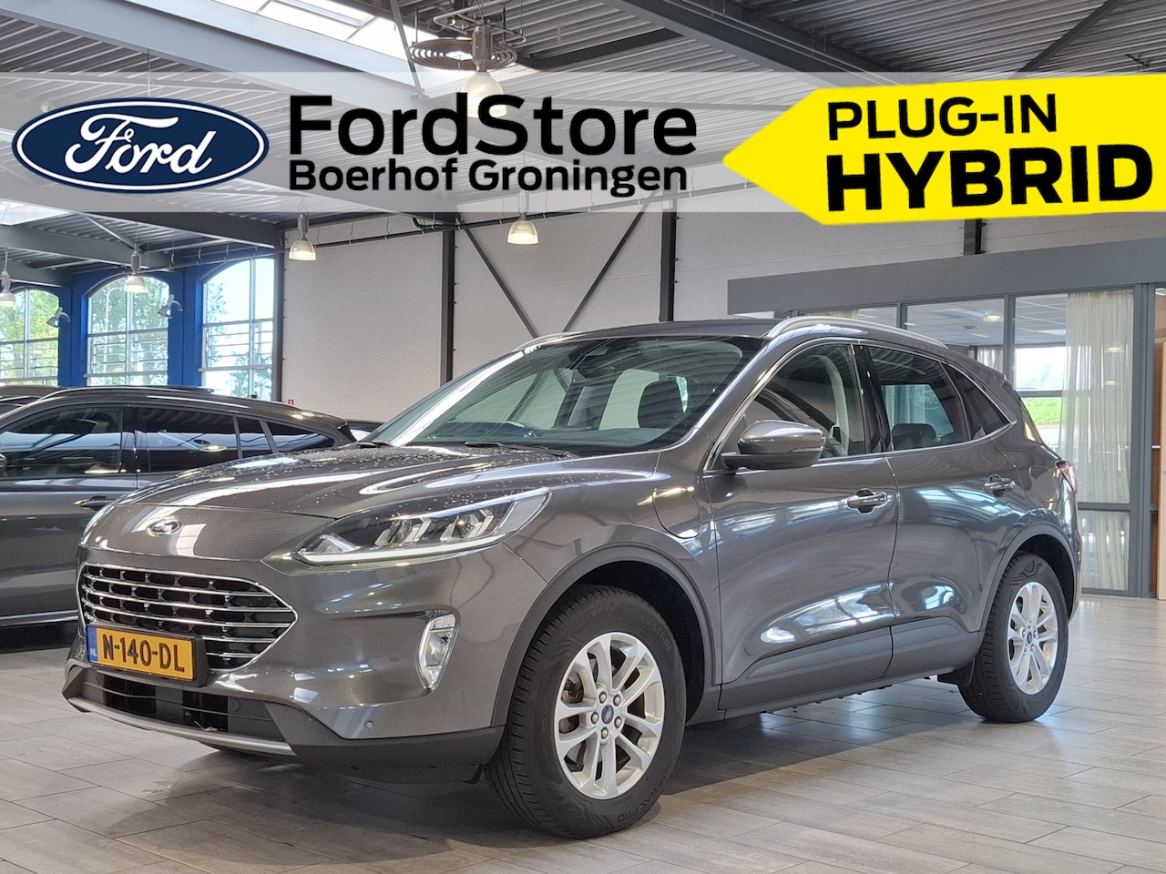 Ford Kuga - 2.5 PHEV 225 pk Titanium | Camera | Navi | Clima | Cruise | Keyless entry | 17" | 4 seiz. - AutoWereld.nl
