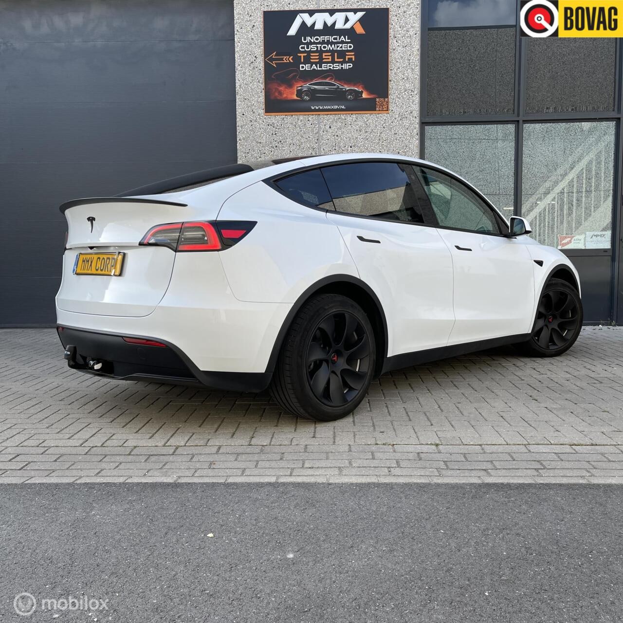 Tesla Model Y - PREMIUM LFP +MMX PACK+ IAP + TREKHAAK+SOH94.6% - AutoWereld.nl
