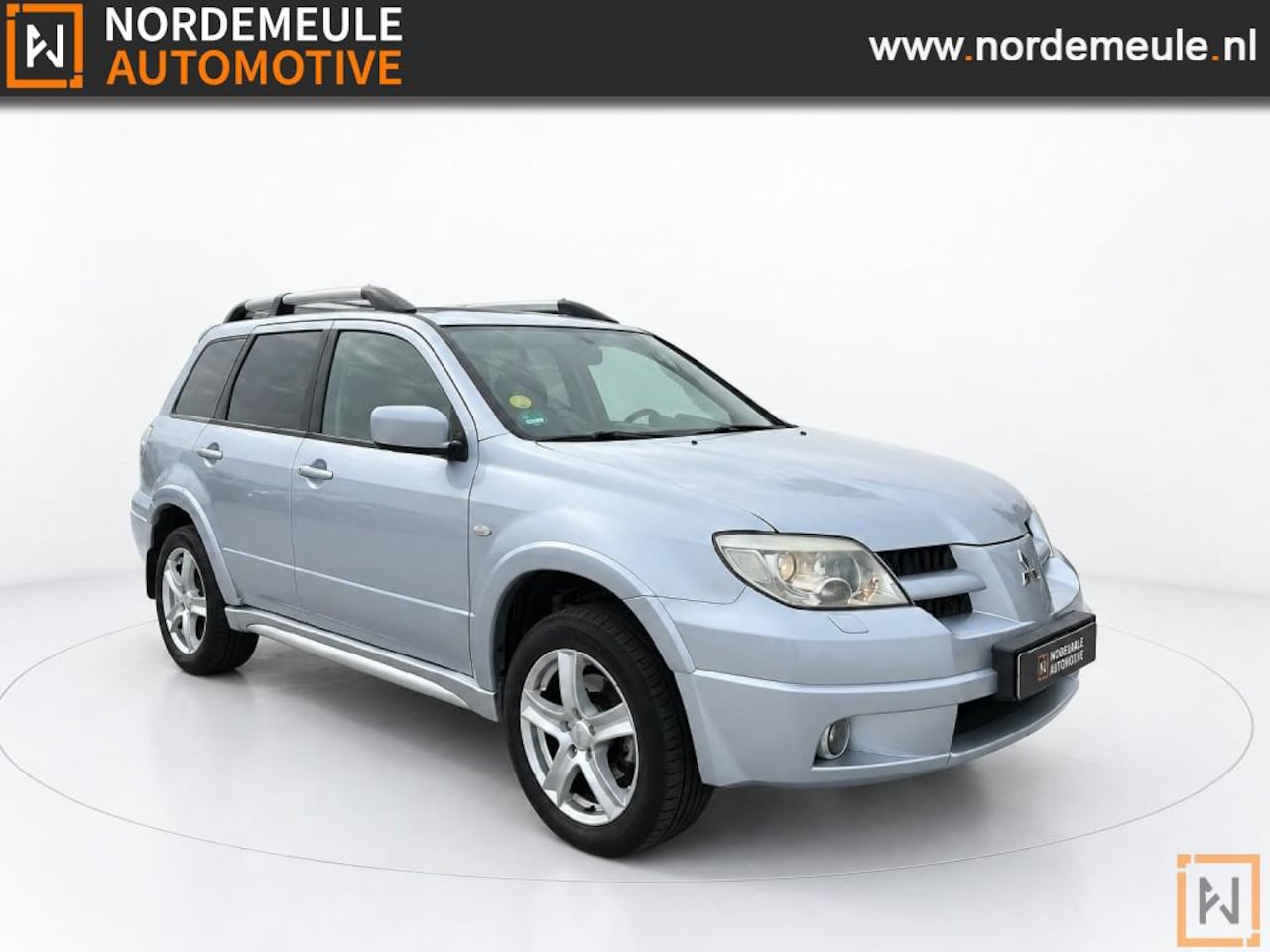 Mitsubishi Outlander - 2.4 Scott 4WD 2.4 SCOTT 4WD, Cruise, AUT, Trekhaak - AutoWereld.nl