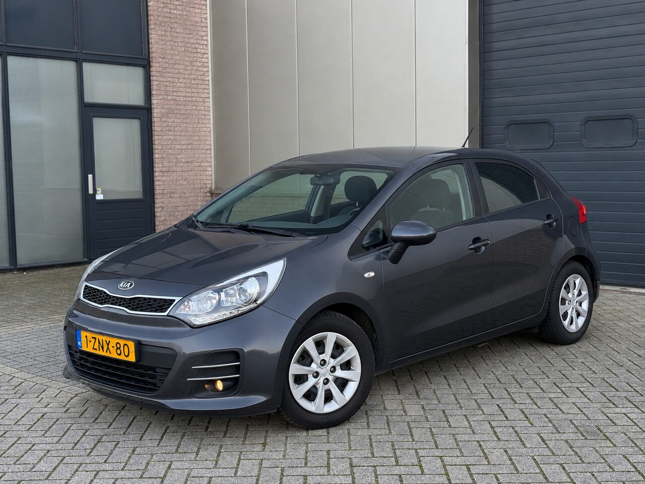 Kia Rio - 1.2 CVVT DynamicLine 2015 Airco/Cruise/Camera/Navi - AutoWereld.nl