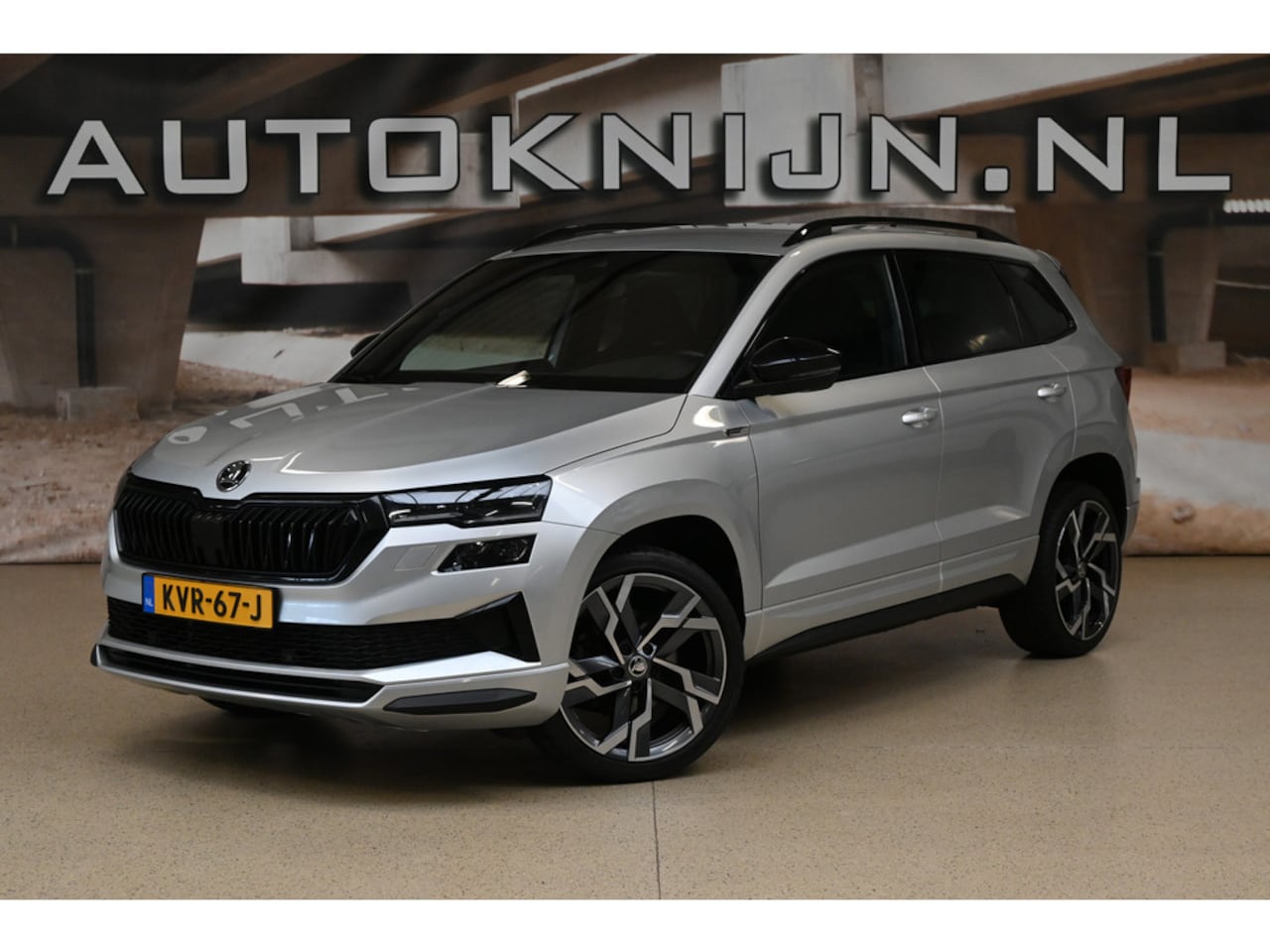 Skoda Karoq - 1.5 TSI ACT Sportline Business | DCC | Matrix | Camera | Winterpakket | 100% (Dealer) onde - AutoWereld.nl
