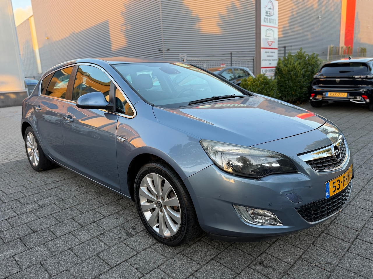 Opel Astra - 1.4 Turbo Cosmo|Airco|APK 2027 - AutoWereld.nl