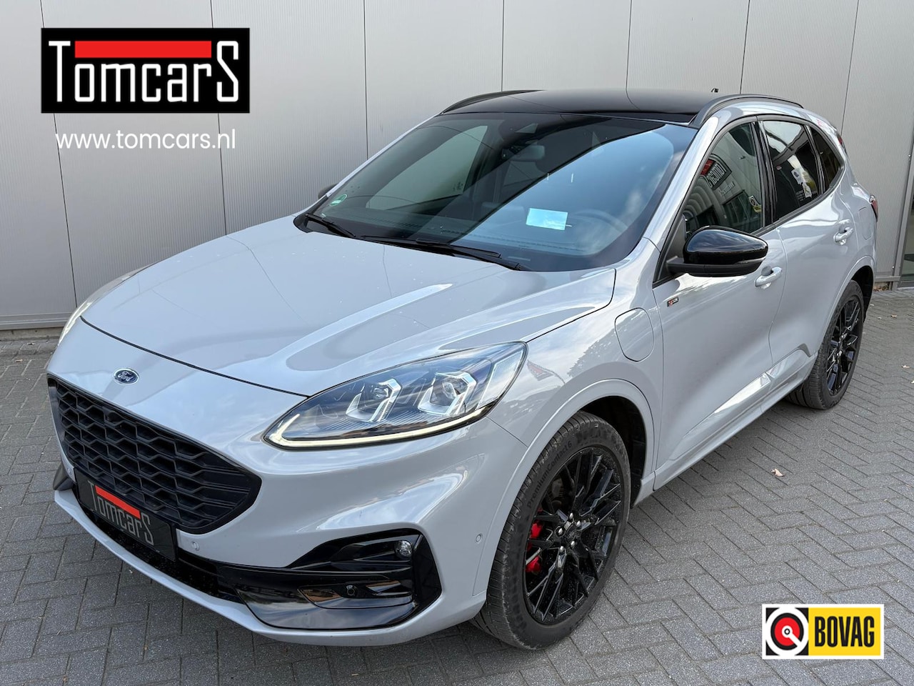 Ford Kuga - 2.5 PHEV ST-Line Graphite Tech Edition Elektr.Trekhaak/Winterpack/Navigatie/Camera - AutoWereld.nl