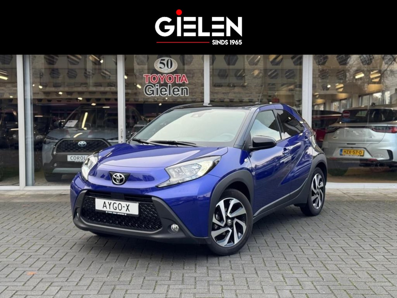 Toyota Aygo X - 1.0 VVT-i MT Pulse Bi-tone | Juniper blue, 17 inch, Privacy glass, Apple CarPlay/Android a - AutoWereld.nl