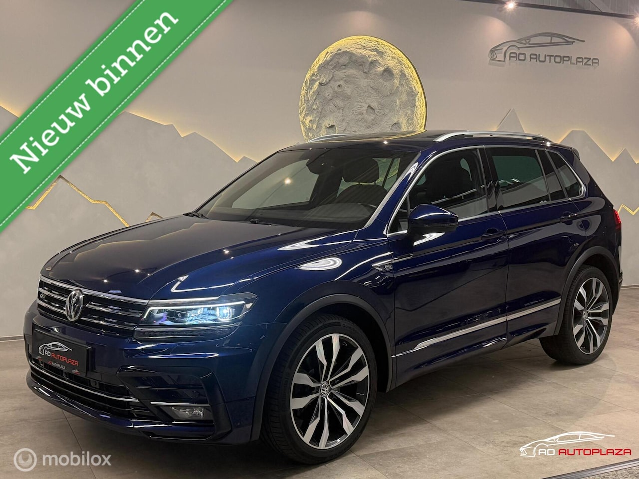 Volkswagen Tiguan - 2.0 TSI 4Motion 3x R-line Panorama/Keyless/Virtual/Trekhaak - AutoWereld.nl