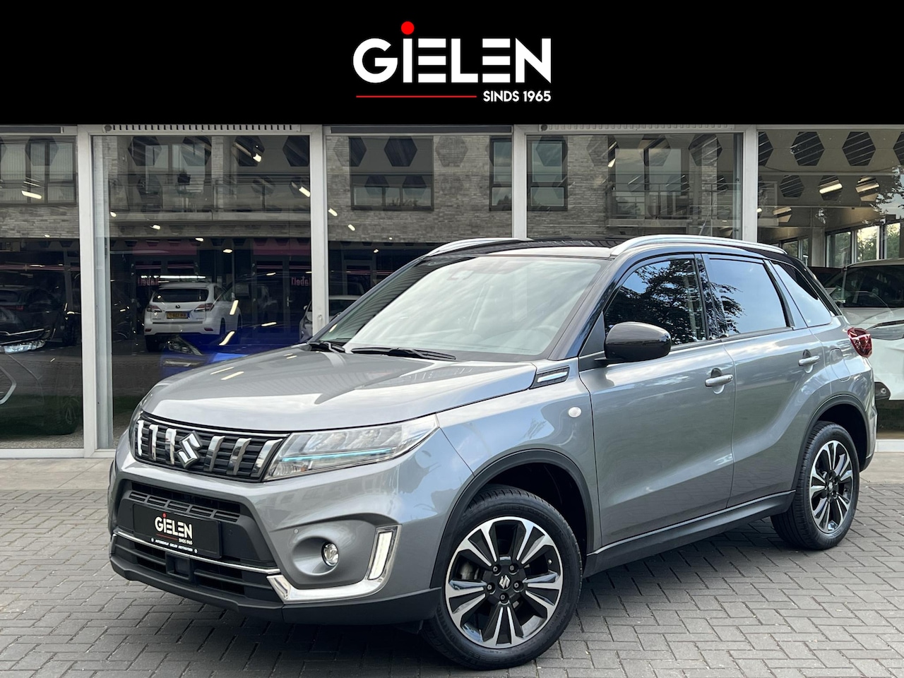 Suzuki Vitara - 1.5 Hybrid Select | Trekhaak, Dodehoekherkenning, LED, Stoelverwarming, Climate control, A - AutoWereld.nl
