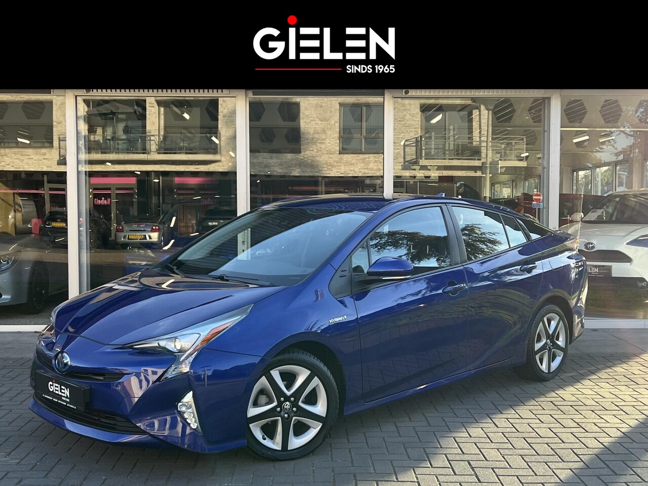 Toyota Prius - 1.8 Dynamic | Trekhaak, Head up display, Parkeercamera, Stoelverwarming, Adaptive cruise c - AutoWereld.nl