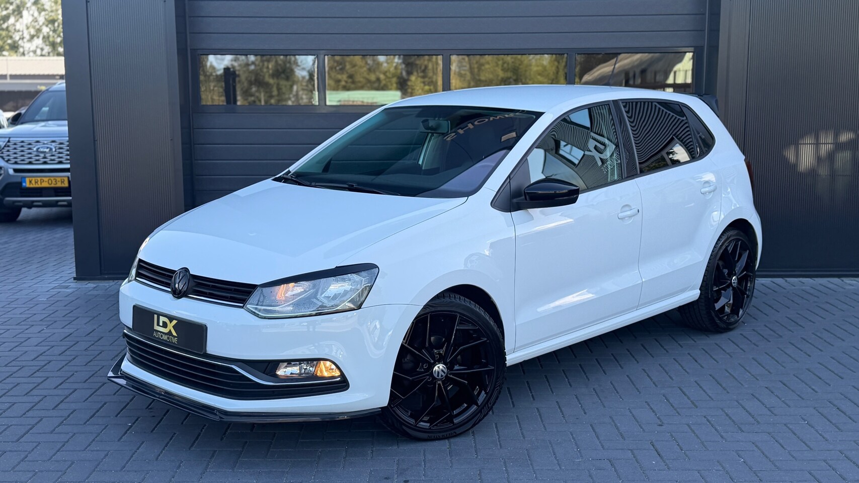 Volkswagen Polo - 1.2 TSI Comfortline Airco|Cruise|NAP|LM velgen|Carplay - AutoWereld.nl