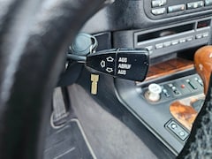 BMW 3-serie Cabrio - 320i Executive AUT 1999 Zwart E36 Airco|Leer