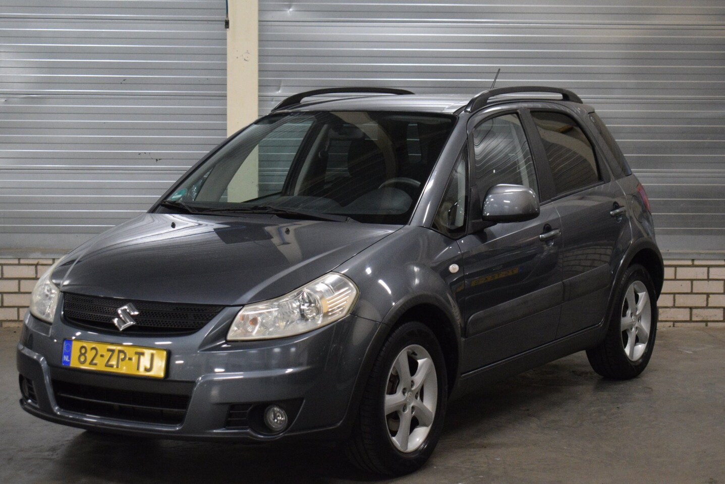 Suzuki SX4 - 1.6 Shogun + Airco|Trekhaak| - AutoWereld.nl