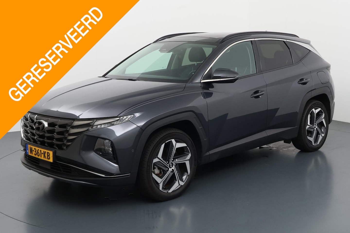Hyundai Tucson - 1.6 T-GDI PHEV PREMIUM SKY 4WD I SCHUIFDAK I AUTOMAAT I 360 CAMERA I APPLE CARPLAY I CLIMA - AutoWereld.nl