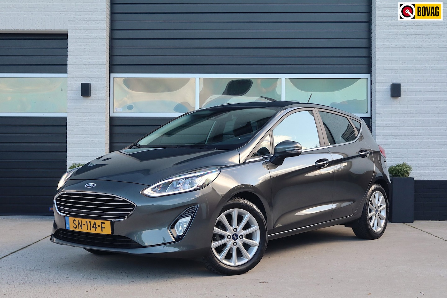 Ford Fiesta - 1.0 EcoBoost 100pk Titanium - Dealeronderhouden - Bang & Olufsen - Climate - Lichtmetalen - AutoWereld.nl