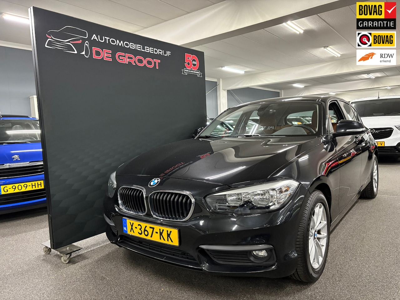 BMW 1-serie - 118i High Executive/ Automaat/ Lederen bekleding/ Navi - AutoWereld.nl