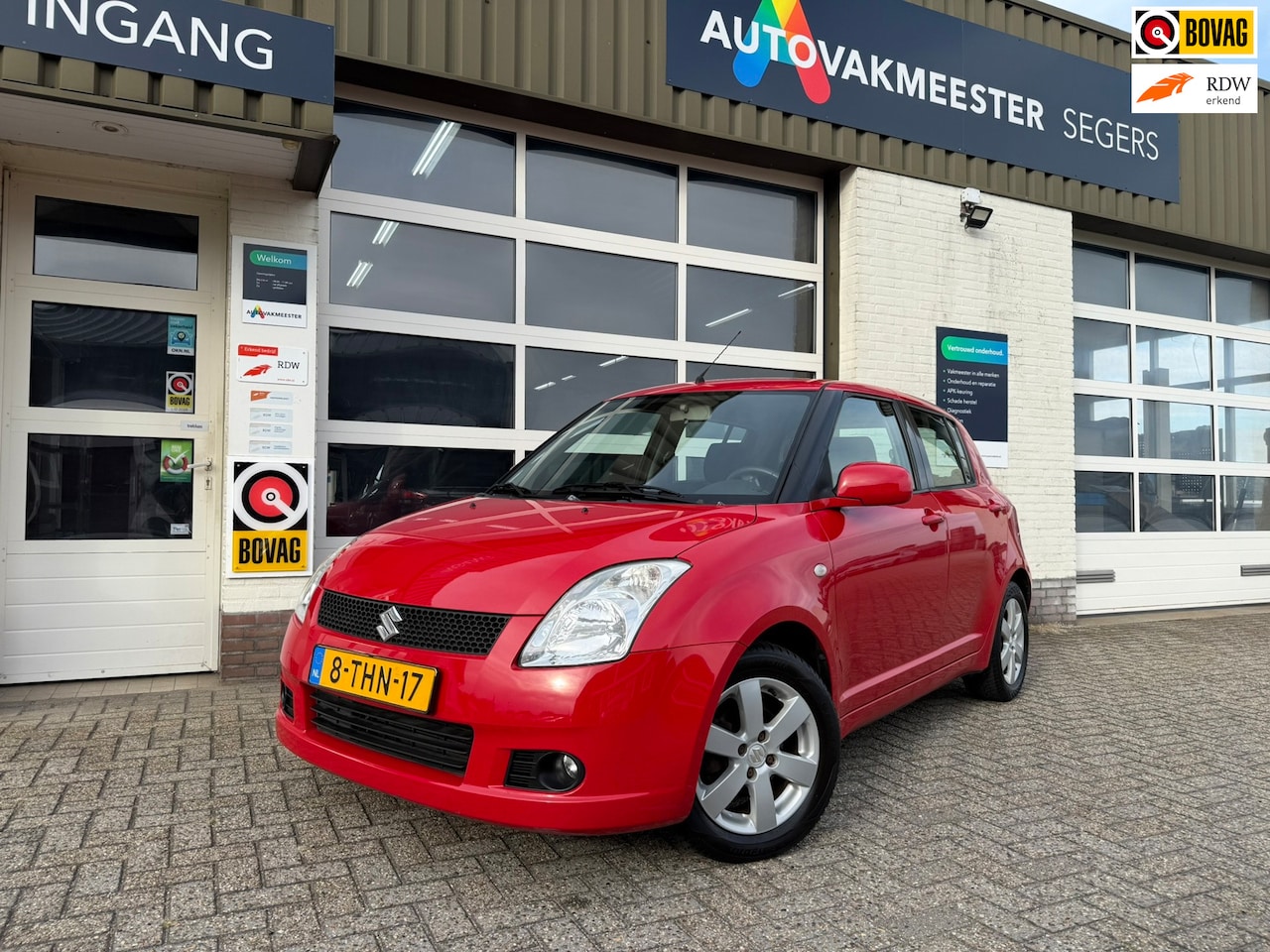 Suzuki Swift - 1.3 Base|Airco|Stoel verwarming| - AutoWereld.nl