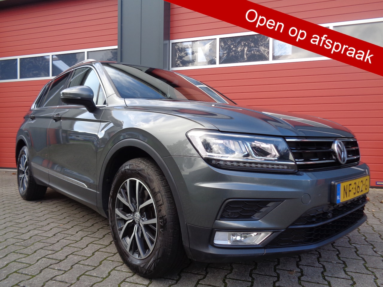 Volkswagen Tiguan - 1.4 TSI Connected Series 126PK Clima Cruise LMV Navi Trekhaak NL-Auto - AutoWereld.nl