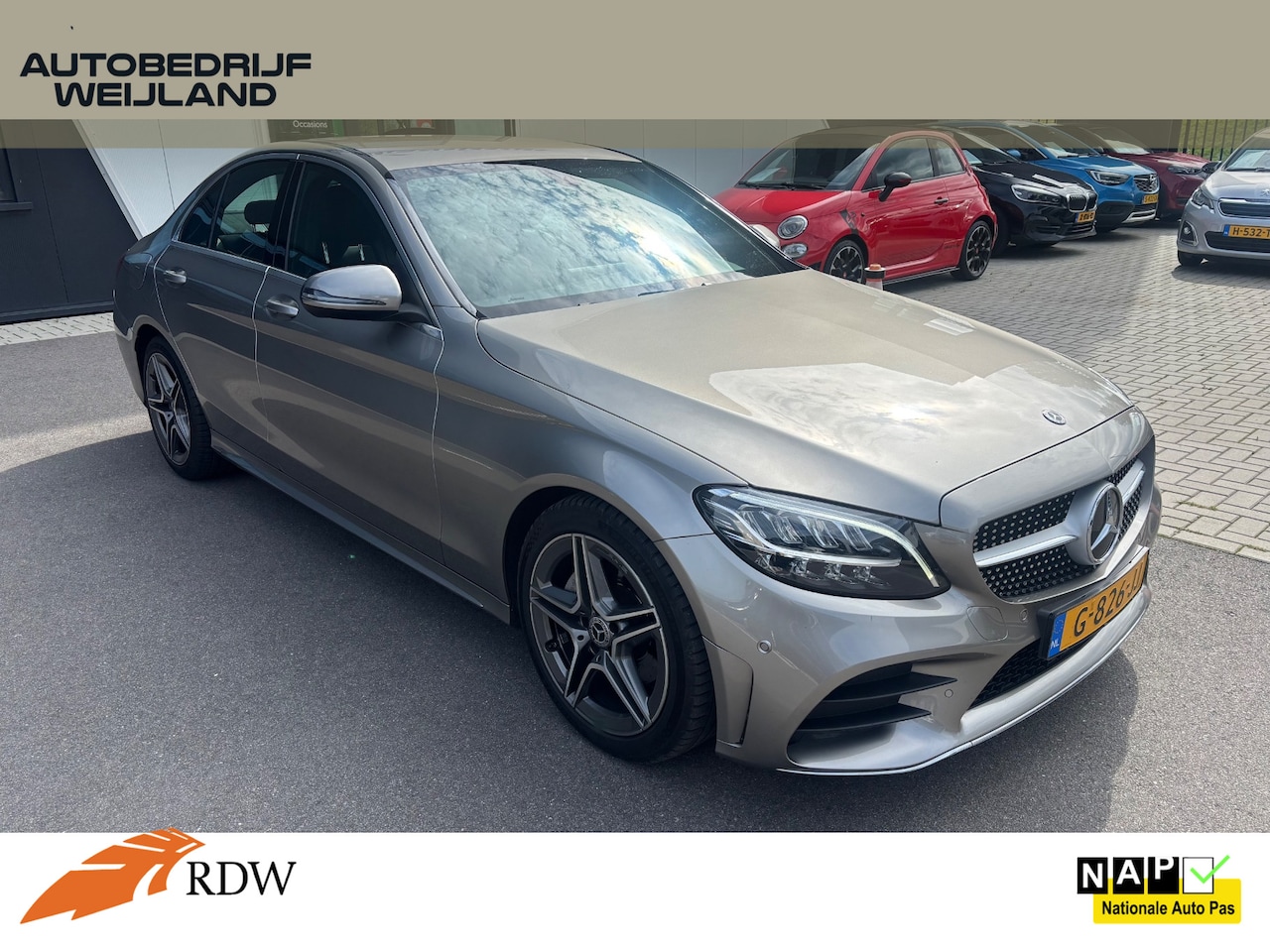 Mercedes-Benz C-klasse - 180 Business Solution AMG-line NIEUWSTAAT FACELIFT I Leer I Camera I PDC I 18" I Apple ca - AutoWereld.nl