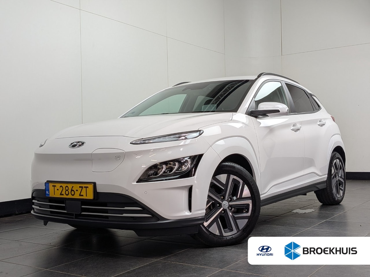 Hyundai Kona Electric - EV Business 64 kWh | SOH 100% | BLISS | Leder | Elek. Stoelen | Warmetepomp | ACC | Apple - AutoWereld.nl