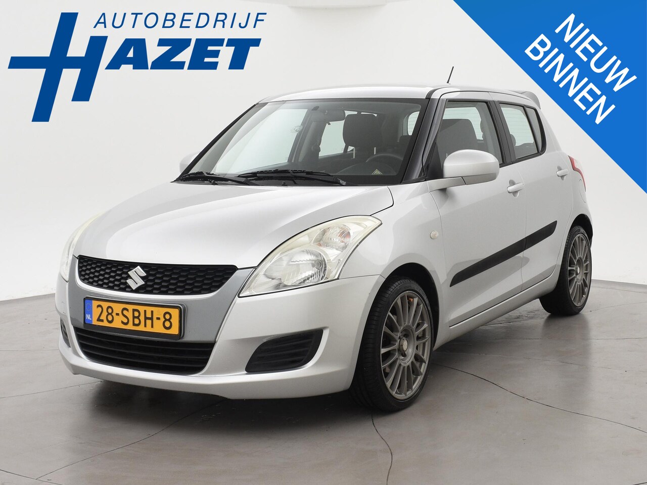 Suzuki Swift - 1.2 SPORT-LINE 5-DEURS + 17 INCH LMV | STOELVERWARMING | AIRCO - AutoWereld.nl
