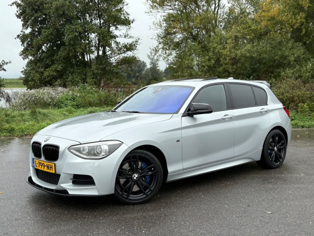 BMW 1-serie - M135i High Executive Pano H&K Leder Camera NIEUWSTAAT - AutoWereld.nl