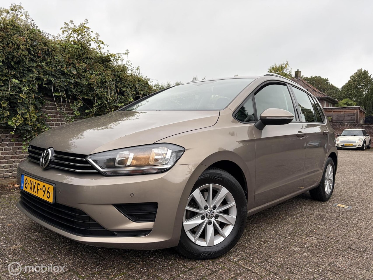 Volkswagen Golf Sportsvan - 1.2 TSI AUTOMAAT / Leder / Navi - AutoWereld.nl