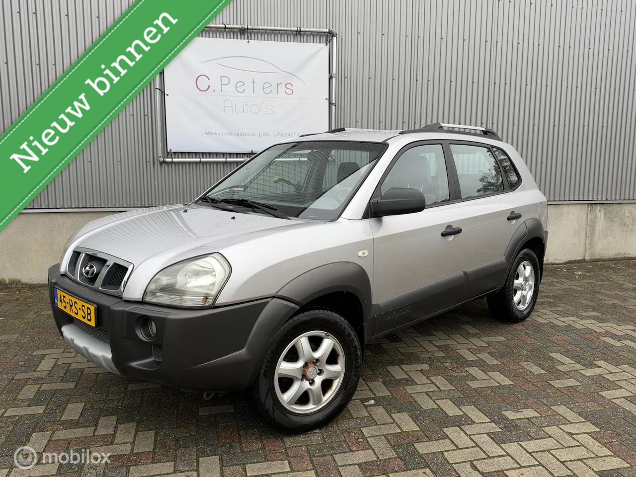 Hyundai Tucson - 2.0i Dynamic 2005 / Airco / Trekhaak / Nieuwe APK / NAP - AutoWereld.nl