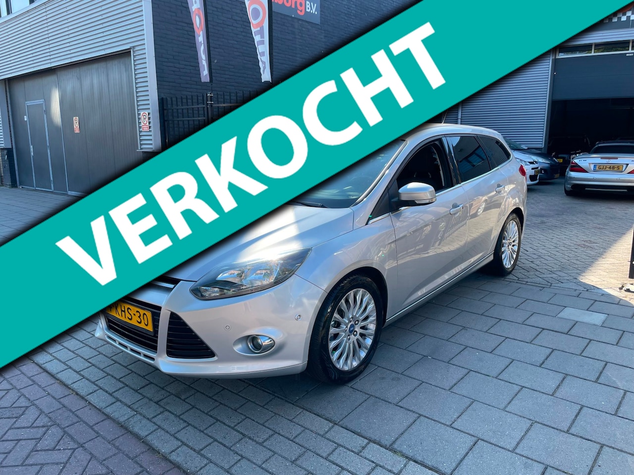 Ford Focus Wagon - 1.0 EcoBoost Titanium Trekhaak Airco Navi NAP APK - AutoWereld.nl