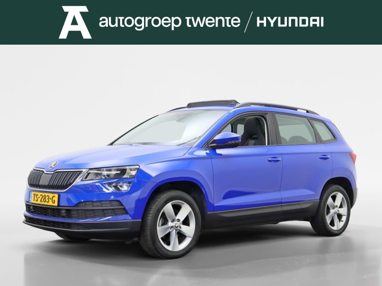 Skoda Karoq - 1.5 TSI ACT Ambition Business | Trekhaak | Camera | All-seasonbanden - AutoWereld.nl