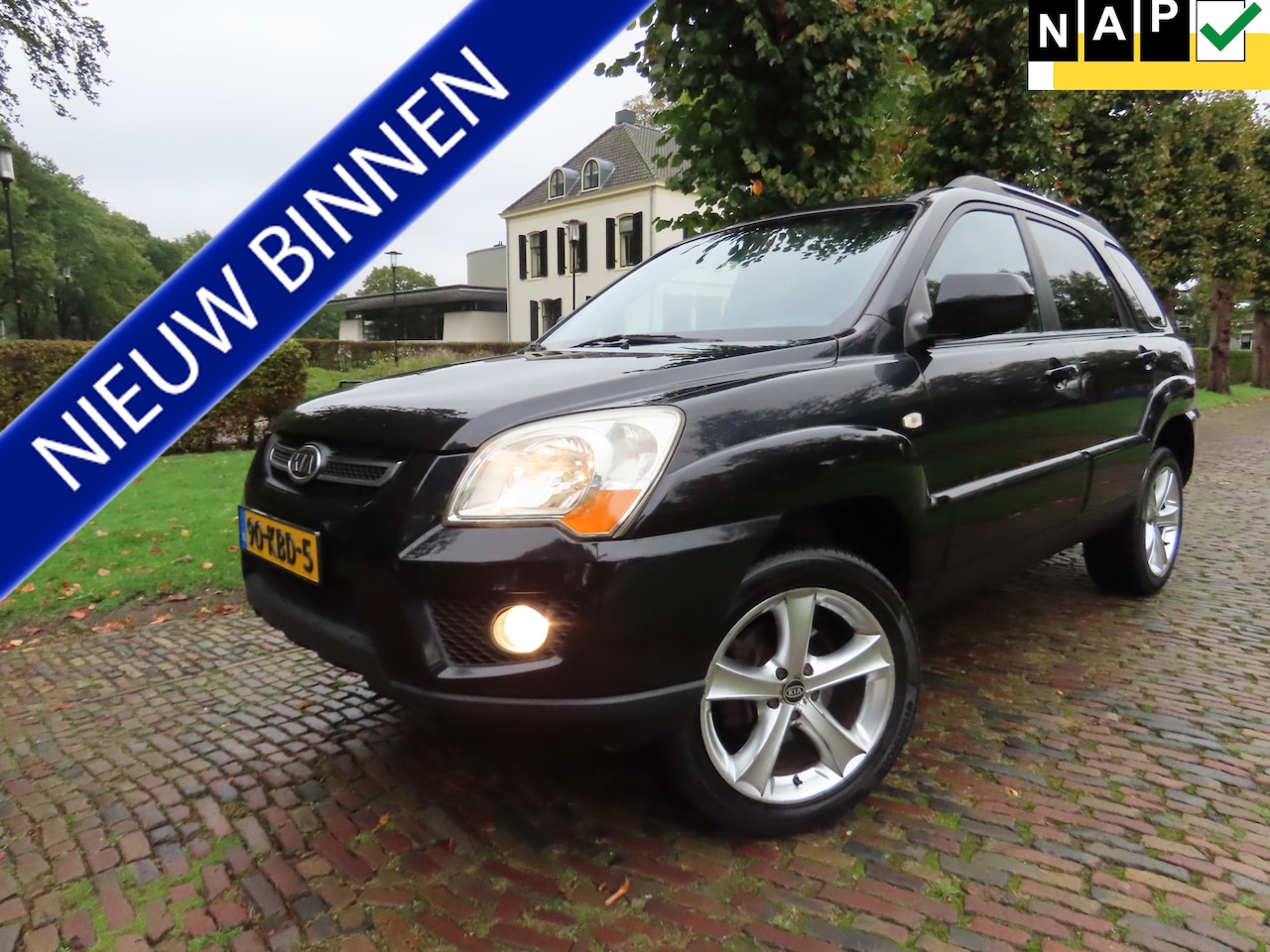 Kia Sportage - 2.0 CVVT X-tra Ecc Cruisecontrol Pdc Lm Velgen Trekhaak - AutoWereld.nl