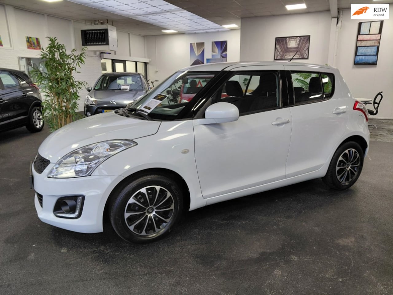 Suzuki Swift - 1.2 Dynamic | Carplay draadloos | Automaat - AutoWereld.nl