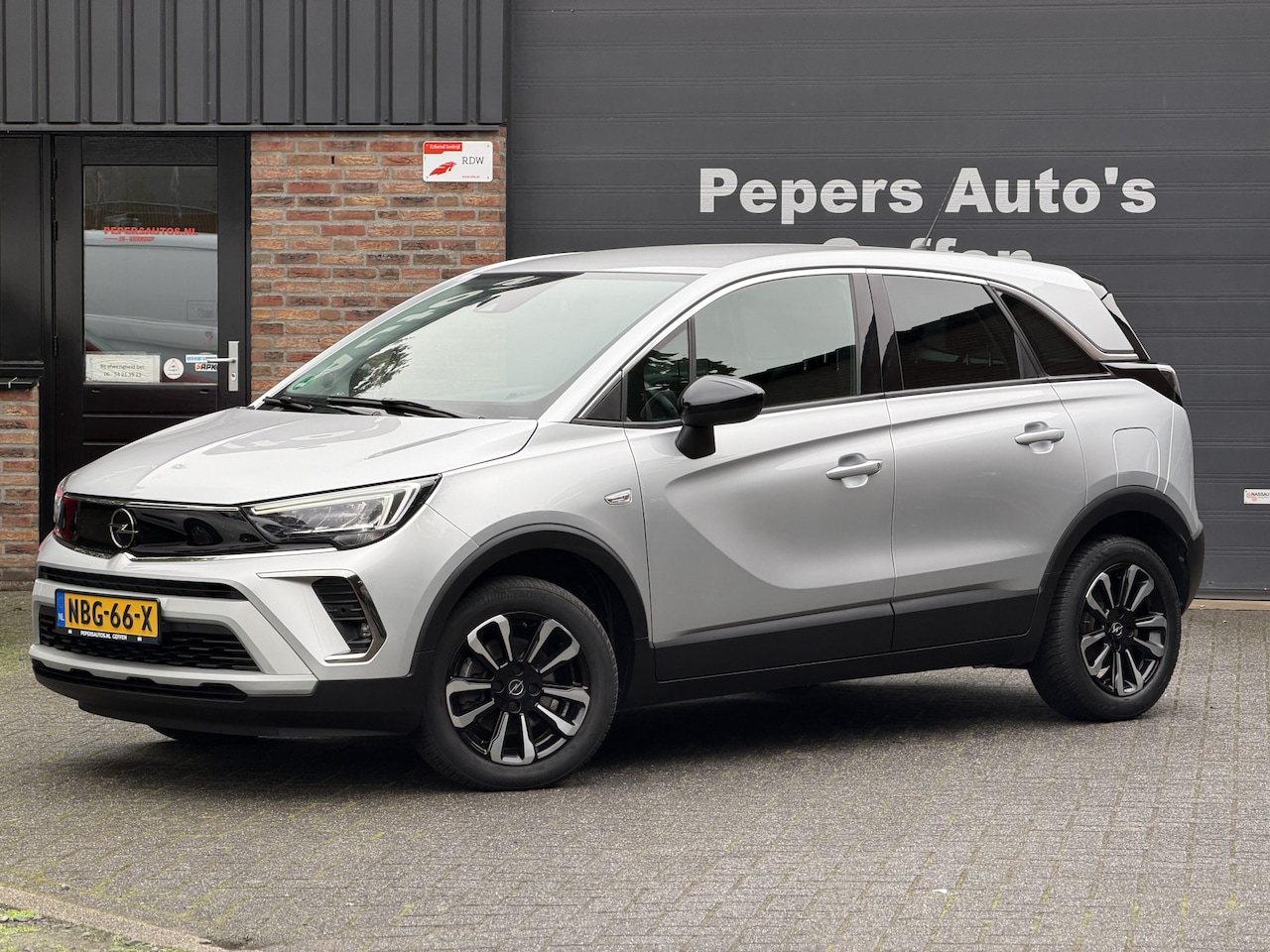 Opel Crossland - 1.2 Turbo AGR-comfortstoel | Half Leder | Navi | Carplay | Camera | Chrome pakket - AutoWereld.nl