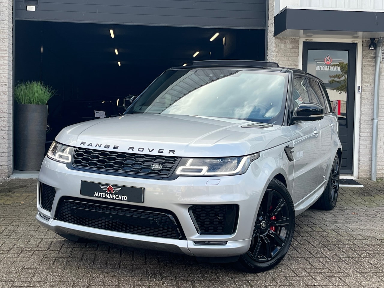 Land Rover Range Rover Sport - 2.0 P400e HSE Dynamic | 404 pk | Two-tone | Panorama | 21” | Indus Silver | Windsor leder - AutoWereld.nl