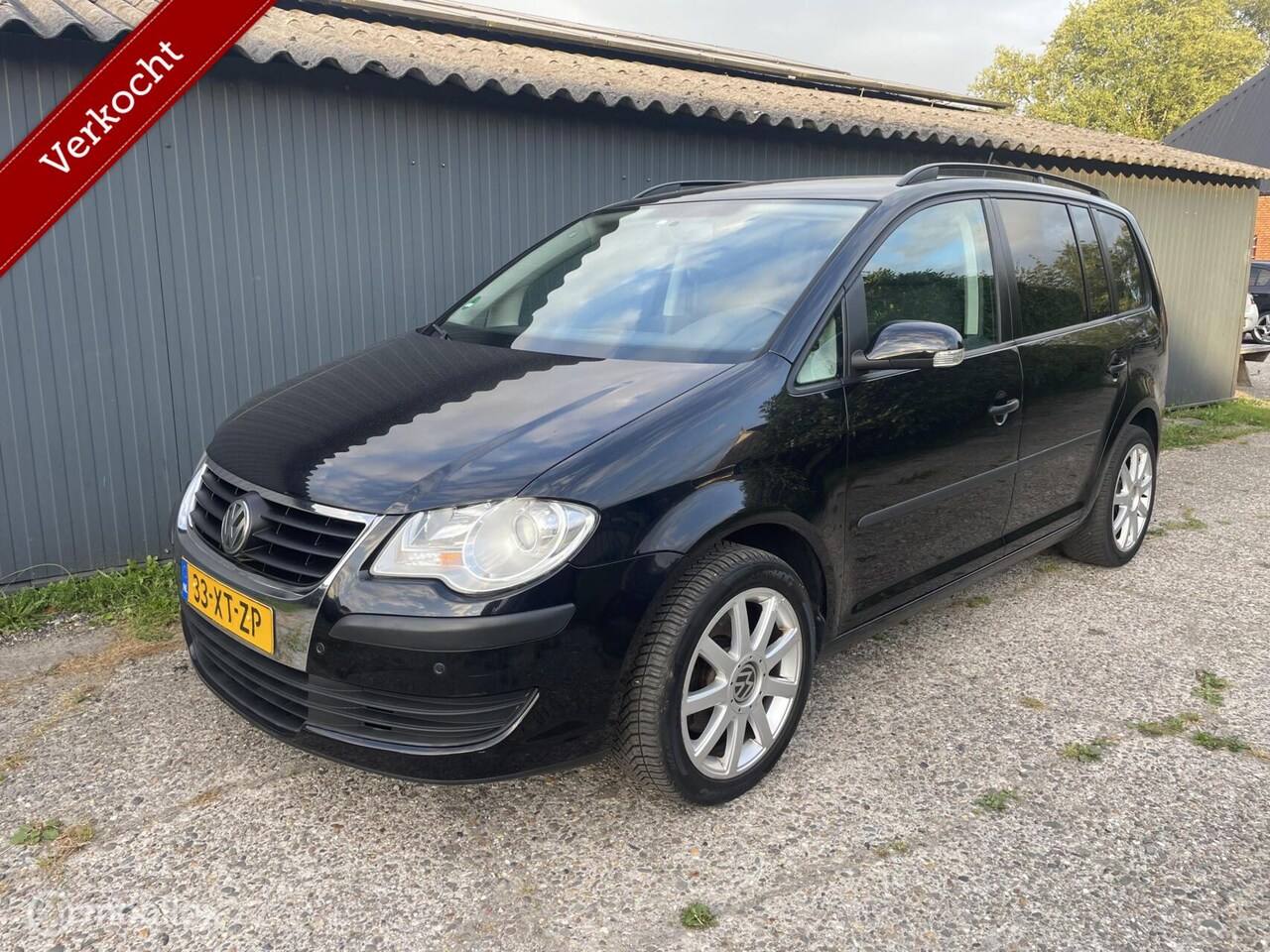 Volkswagen Touran - 1.4 TSI Trendline Business Cruise Clima Trekhaak - AutoWereld.nl