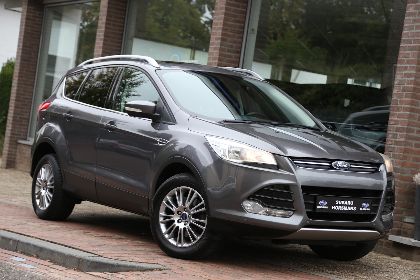 Ford Kuga - 1.6 Titanium Plus 4WD Leer Schoufdak Navi - AutoWereld.nl