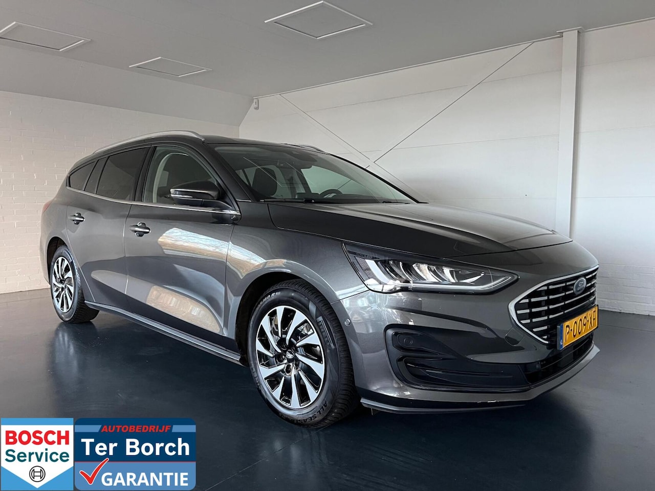 Ford Focus Wagon - 1.0 EcoBoost Hybrid Titanium 1.0 EcoBoost Hybrid Titanium,Stoel/Stuur/Voorruit verwarming - AutoWereld.nl