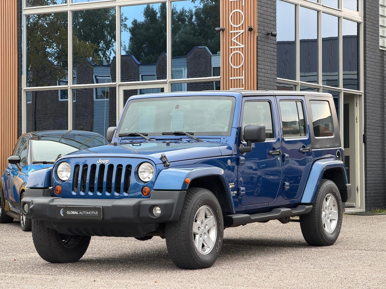 Jeep Wrangler Unlimited - 3.8 Sahara - Afneembaar Dak - Centrale vergrendeling - Elektrische ramen - AutoWereld.nl