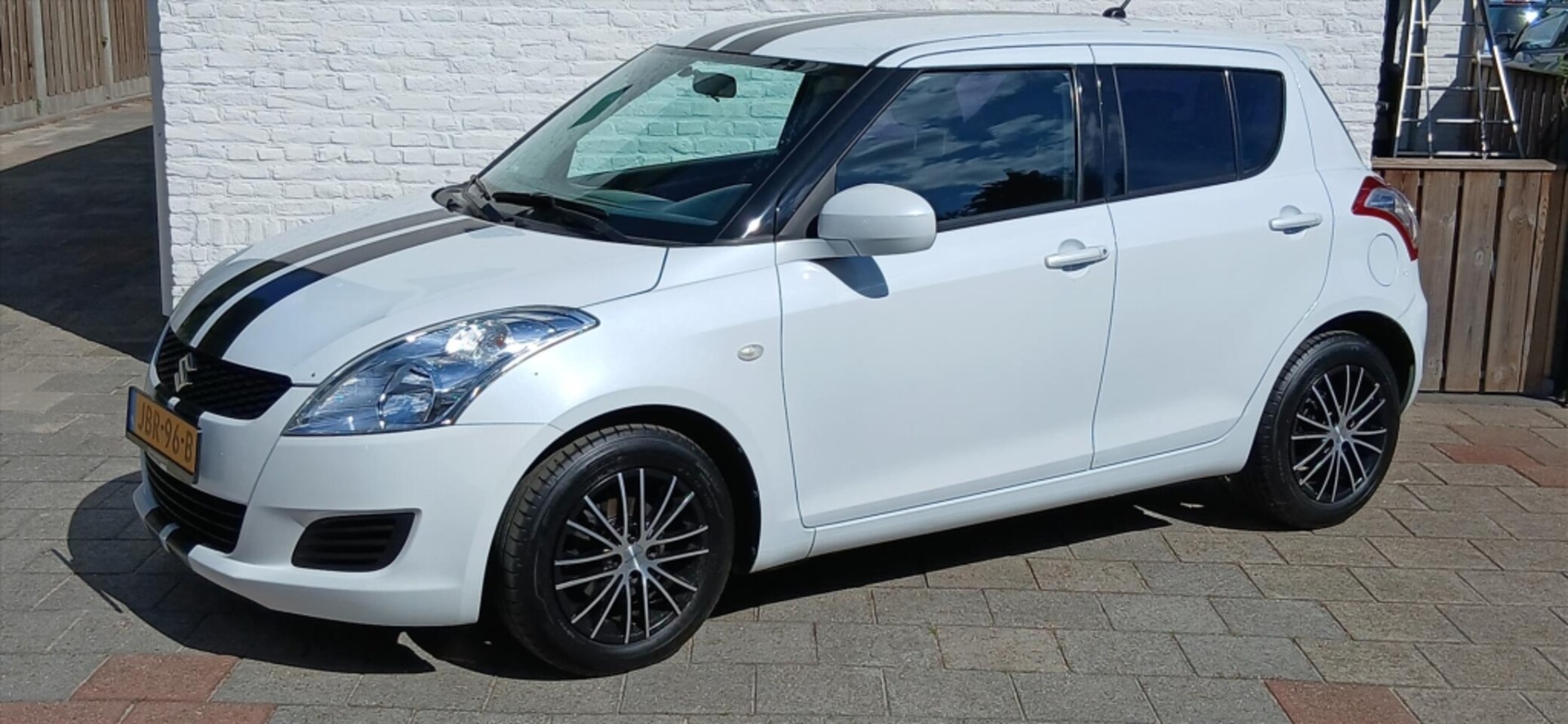 Suzuki Swift - 1.2 5DRS COMFORT AIRCO LMV ZEER MOOI - AutoWereld.nl
