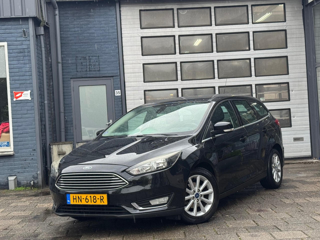 Ford Focus Wagon - 1.0 Titanium Edition | Clima | Cruise | Navi - AutoWereld.nl