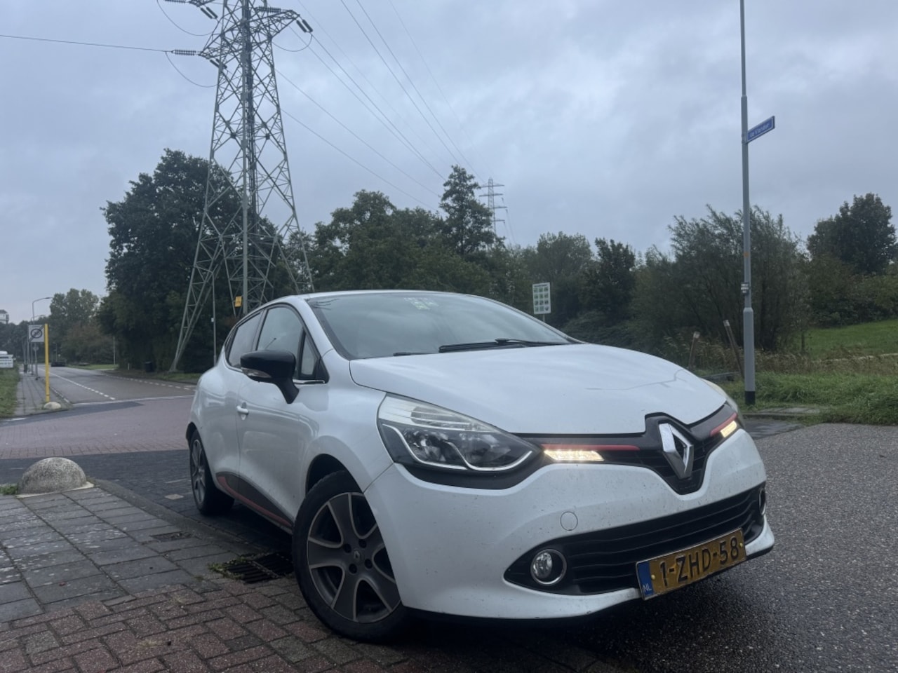 Renault Clio - 1.5 dCi Night&Day Navi Clima Sens Cruise - AutoWereld.nl